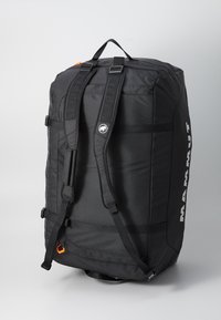 Black travel backpack with adjustable straps, a top handle, and a large compartment. Features durable fabric and a logo on the side.