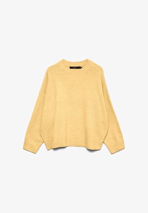 Morbido maglione oversize giallo pallido, lavorato a maglia, con maniche lunghe e collo rotondo, polsini e orlo a coste, mostrato steso su sfondo bianco.