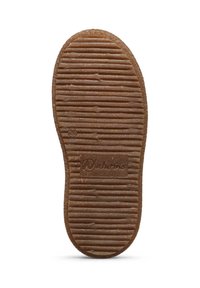 Suola di scarpa in gomma marrone con superficie testurizzata, caratterizzata da scanalature orizzontali e verticali, e un logo Naturino nella parte del tallone.