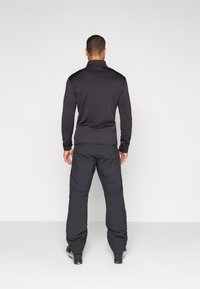 J.LINDEBERG Sports CLARKE - Sínadrág - black
