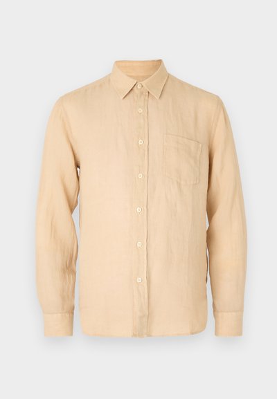 Bežena lanena srajca z dolgimi rokavi in gumbasto ovratnikom, sprednjim žepom in gladko, rahlo teksturirano površino. Klasičen kroj in preprost dizajn.