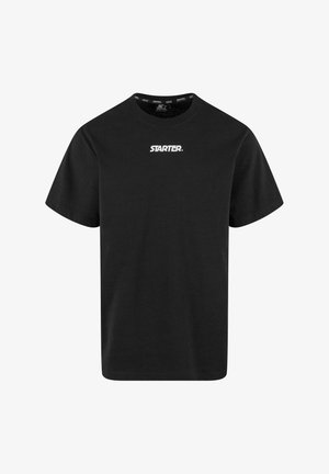T-shirt noir en coton à manches courtes, col rond, avec le logo "STARTER" blanc à l'avant. Coupe standard, texture douce.