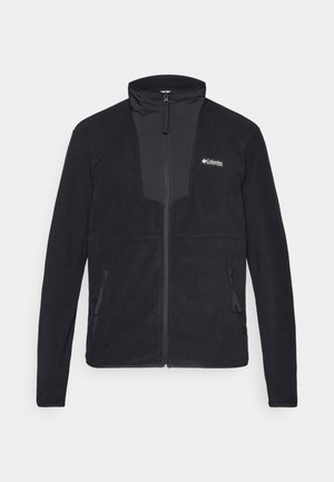Svart fleece-jakke med hel glidelås og ståkrage, glidelåslommer i sidene og hvit Columbia-logo på venstre bryst.