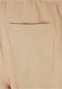 Urban Classics Jogginghose - unionbeige