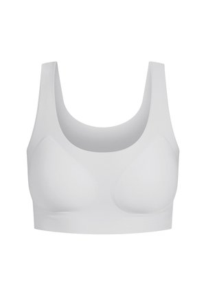 Soutien-gorge blanc en tissu lisse et extensible. Il possède un décolleté en scoop, des bretelles larges et des bonnets moulés doux. Design simple, sans quincaillerie ni motifs visibles.