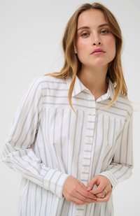 Long-sleeve button-up shirt in white with light blue vertical stripes. Features a classic collar and soft, smooth fabric.