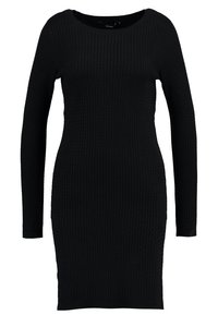 Abito nero lavorato a maglia con maniche lunghe, scollatura rotonda, texture a costine, forma aderente e un orlo che arriva a metà coscia. Senza ulteriori decorazioni.