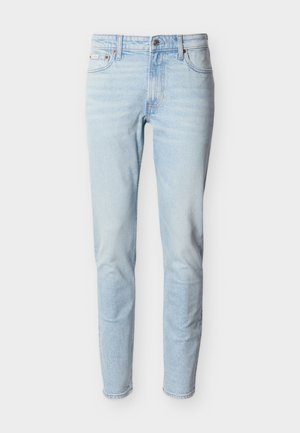 Lyseblå denimjeans med en slank passform, som har et klassisk design med fem lommer, subtil falming og en standard knappelukking.