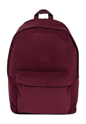 Sac à dos en tissu rouge foncé avec poche avant zippée, poignée de transport et logo subtilement embossé sur le compartiment principal.