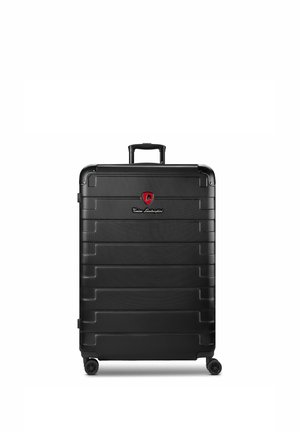 Grote zwarte harde koffer met vier wielen, telescoopgreep en een rood Tonino Lamborghini-logo aan de voorkant.