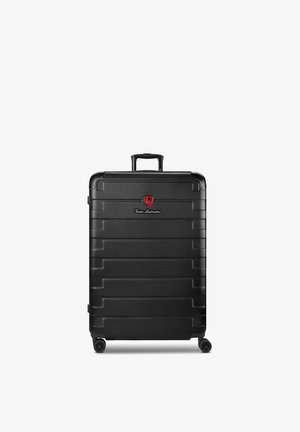 Grote zwarte harde koffer met vier wielen, telescoopgreep en een rood Tonino Lamborghini-logo aan de voorkant.