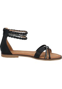 Sandal nera con cinturino alla caviglia, caratterizzata da dettagli intrecciati e accenti metallici, parte superiore liscia, suola piatta e soletta imbottita.