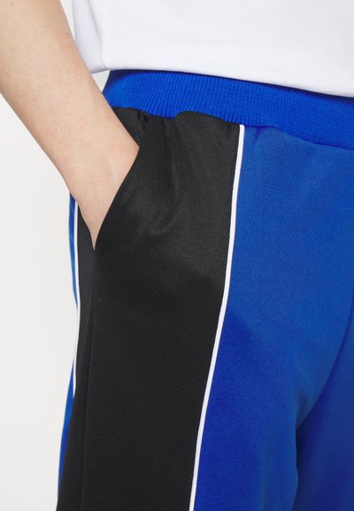 Alexandra Moura DUALITY TROUSERS - Donji dijelovi trenirke - sports blue
