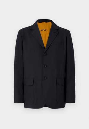 Navy blazer with a notched lapel, four buttons, two front pockets, and a vibrant yellow interior lining. Smooth fabric texture.