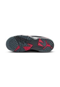 Semelle de chaussure noire avec une surface texturée ; présente des accents géométriques roses et gris ainsi qu'un logo Jumpman bien en vue. Des motifs circulaires et triangulaires sont visibles.