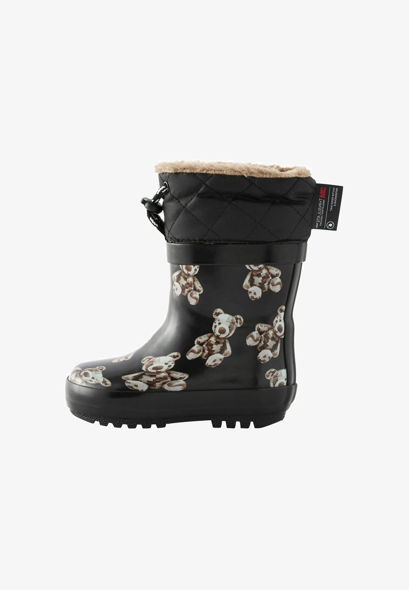Black rubber rain boot featuring a fuzzy tan cuff, quilted texture, and a repeating teddy bear pattern in brown and cream colors.