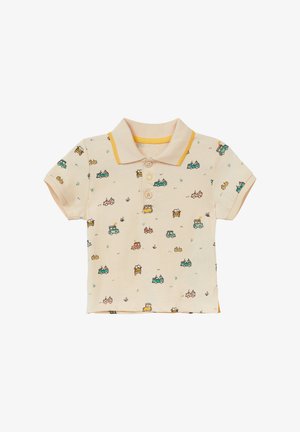 Koszulka polo w jasnym beżu z żółtym akcentem kołnierza. Posiada nadruk w kolorowe samochody oraz szczegóły przypominające trawę. Wykonana z bawełny.