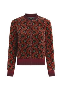 Giacca bomber in velluto bordeaux con motivo a onde multicolori, polsini e orlo a coste, e chiusura con zip frontale. Dettaglio del tessuto testurizzato.