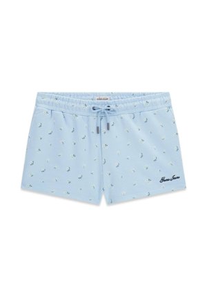Light blue women's shorts with small white floral print, elastic waistband, drawstring, and "Guess Jeans" logo on the front.