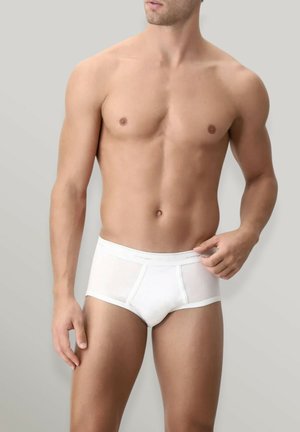 Slip bianco in cotone con un morbido elastico in vita, caratterizzato da una texture liscia e una vestibilità aderente. Il design non presenta motivi o loghi visibili.