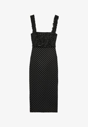 Musta midi-mekko valkoisilla pilkuilla, kuminauhalla rypytetty yläosa ja leveät, röyhelöiset olkahihnat.