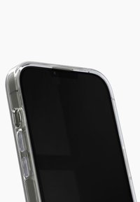 Clear smartphone case with a smooth, transparent finish. Features rounded edges, button cutouts, and a camera opening at the top.