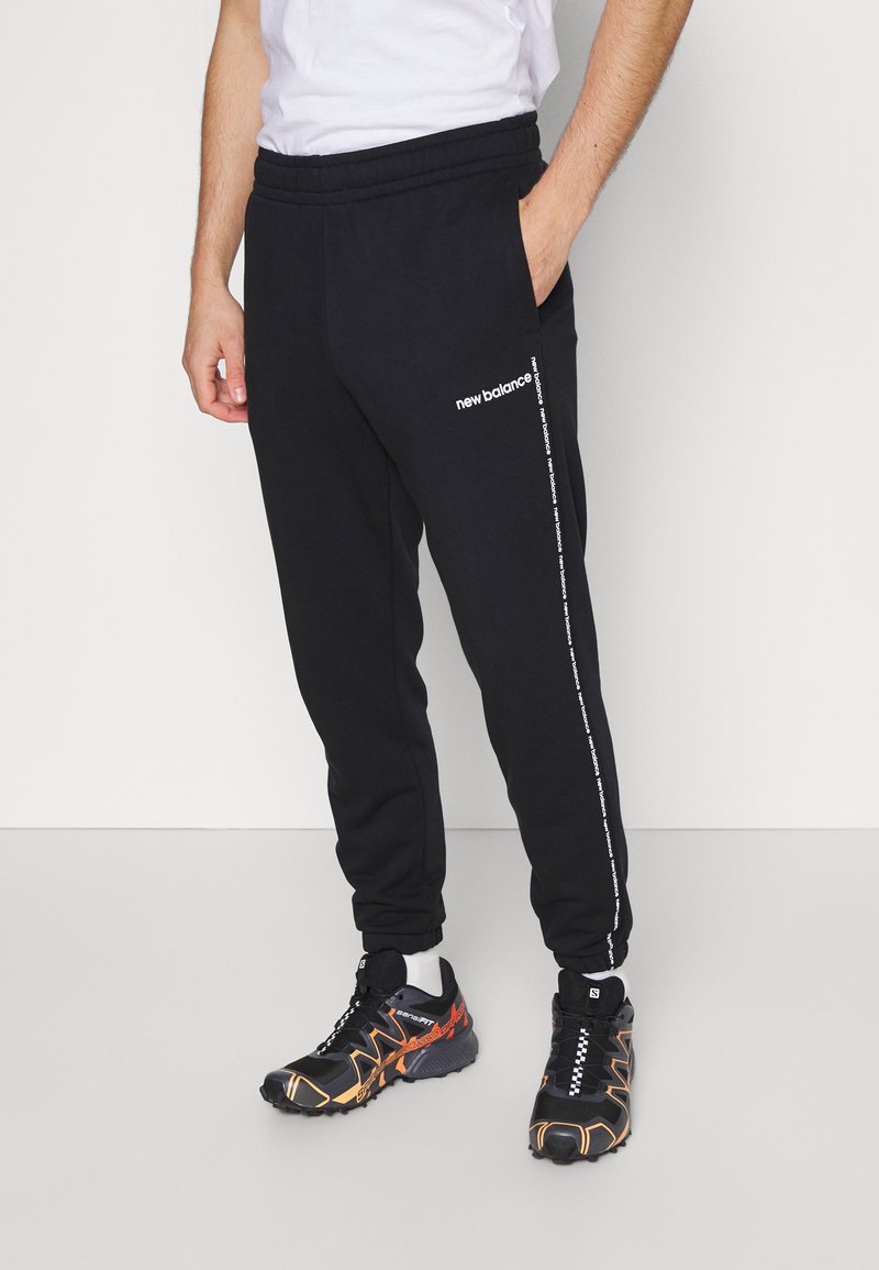 New Balance ESSENTIALS JOGGER Tracksuit bottoms black Zalando.de