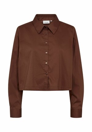 Pruun pikkade varrukatega lühendatud särk, millel on terava kraaga ja ees nööpide sulgemine, valmistatud siledast kangast.