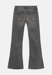 Gray flared jeans made of denim, featuring a high waist, side pockets, and embellished stitching. The fabric has a smooth texture.