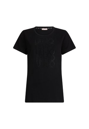 T-shirt nera a maniche corte con scollo rotondo, caratterizzata da un design testurizzato di lettere e punti sul davanti. Tessuto morbido con una finitura liscia.