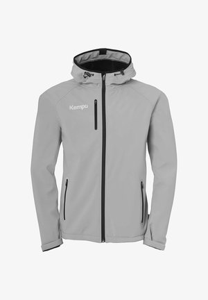 Chaqueta softshell gris claro con capucha, detalles en cremallera negra, dos bolsillos con cremallera y un logo en la parte superior izquierda del pecho.