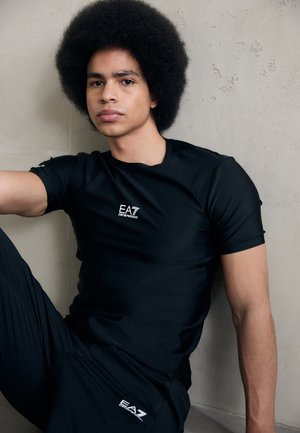TEE - T-skjorte til trening - black