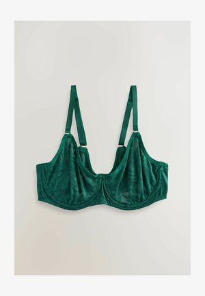 Roheline pitsiline rinnahoidja reguleeritavate satiinist rihmadega, millel on lillemuster ja pehme, tekstureeritud viimistlus. Rinnahoidja on kujundatud klassikaliseks.