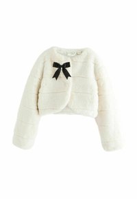 Trumpa balta dirbtinio kailio striukė su horizontaliais dryžiais, ilgomis rankovėmis ir juodu kaspinu priekyje. Minkšta tekstūra ir apvali iškirptė.