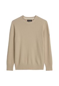 Pull à col rond en maille côtelée beige avec manches longues et un petit patch logo sur le haut du bras gauche, posé à plat sur un fond blanc.