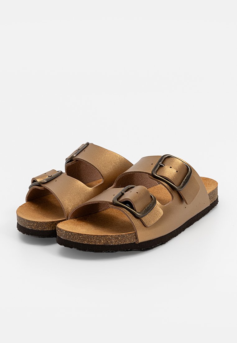 Sandales à glissière métalliques marron avec deux sangles réglables à boucle, une semelle en liège et une semelle extérieure en caoutchouc texturé noir.
