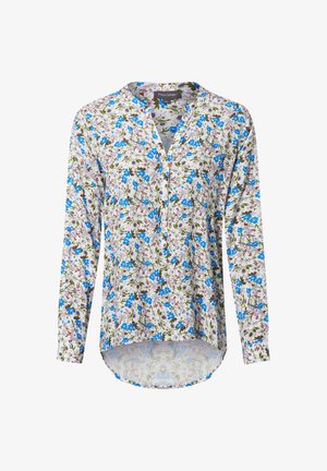 Blusa a maniche lunghe in tessuto leggero, con uno sfondo bianco decorato da motivi floreali blu e viola, scollo a V e orlo curvo.