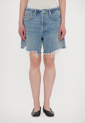 Denim shorts in light blue featuring a frayed hem, raw edges, and a classic five-pocket design with a button closure at the waist.