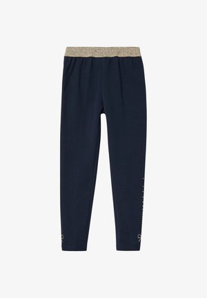 Navy legging gemaakt van rekbaar materiaal, met een glinsterende gouden tailleband en decoratieve accenten met kleine strassteentjes aan de zijkant.