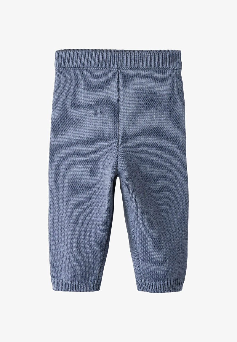 Dziewczęce niebieskie legginsy dla niemowląt z dzianiny, z ribbowanym paskiem w talii, dopasowanym krojem i fakturowanym wzorem stulu. Brak dodatkowych elementów czy akcentów.