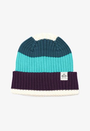 Neulottu pipo, jossa leveät vaakaraidat väreissä kerma, tumma sinivihreä, turkoosi ja violetti. Violetissa osassa pieni valkoinen logopläjäys.