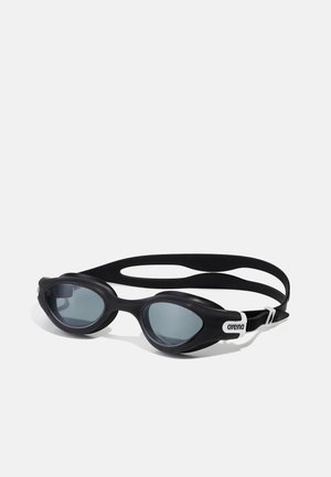 Lunettes de natation noires au design aérodynamique, verres teintés et monture en caoutchouc souple. Comprend une sangle réglable avec un logo blanc.