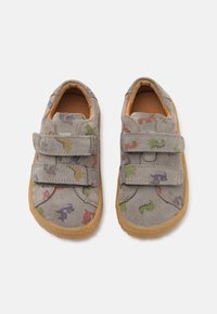 Gray suede shoes with two velcro straps, featuring colorful dinosaur patterns. Rubber soles provide grip and durability.