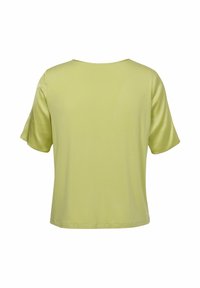 Korte mouwen limoengroene T-shirt met een ronde halslijn en een zachte textuur, met een losse pasvorm en zonder zichtbare logo's of patronen.