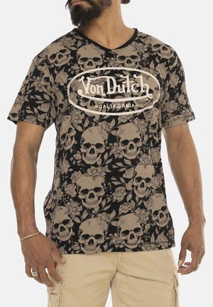 T-shirt noir à manches courtes avec un motif de crâne floral et des accents beiges. Le logo centré indique "Von Dutch California". Design encolure en V.