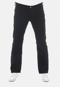 Jeans de mezclilla negra con corte recto, cinco bolsillos y cierre de botón. Presentan una textura suave y un diseño minimalista.