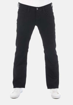 Jeans de mezclilla negra con corte recto, cinco bolsillos y cierre de botón. Presentan una textura suave y un diseño minimalista.