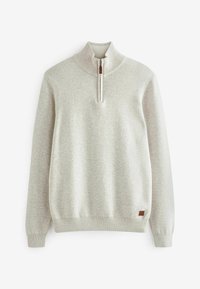 Pull gris clair à manches longues avec col et poignets côtelés, avec une courte fermeture éclair et une petite étiquette marron près de l'ourlet.