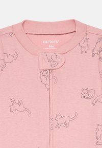 Light pink baby onesie featuring black outline cat graphics, snap closure, and ribbed neckline. Made of soft cotton material.