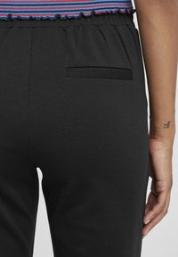 Oxmo OXANITA REGULAR FIT - Tracksuit bottoms - black